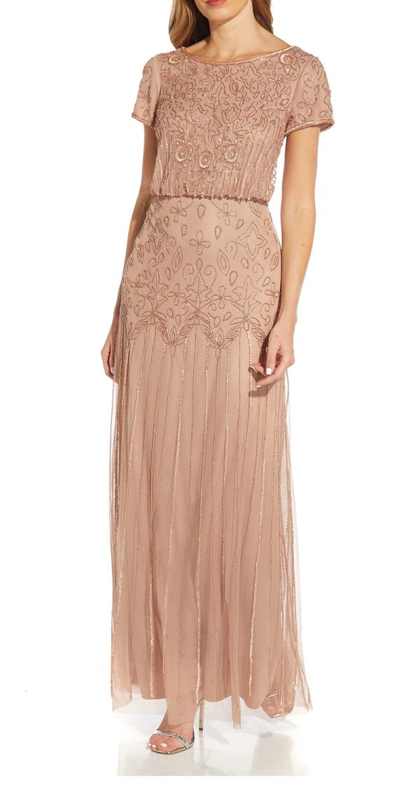 VESTIDO CON CORTE EN LA CINTURA DE PEDRERIA
